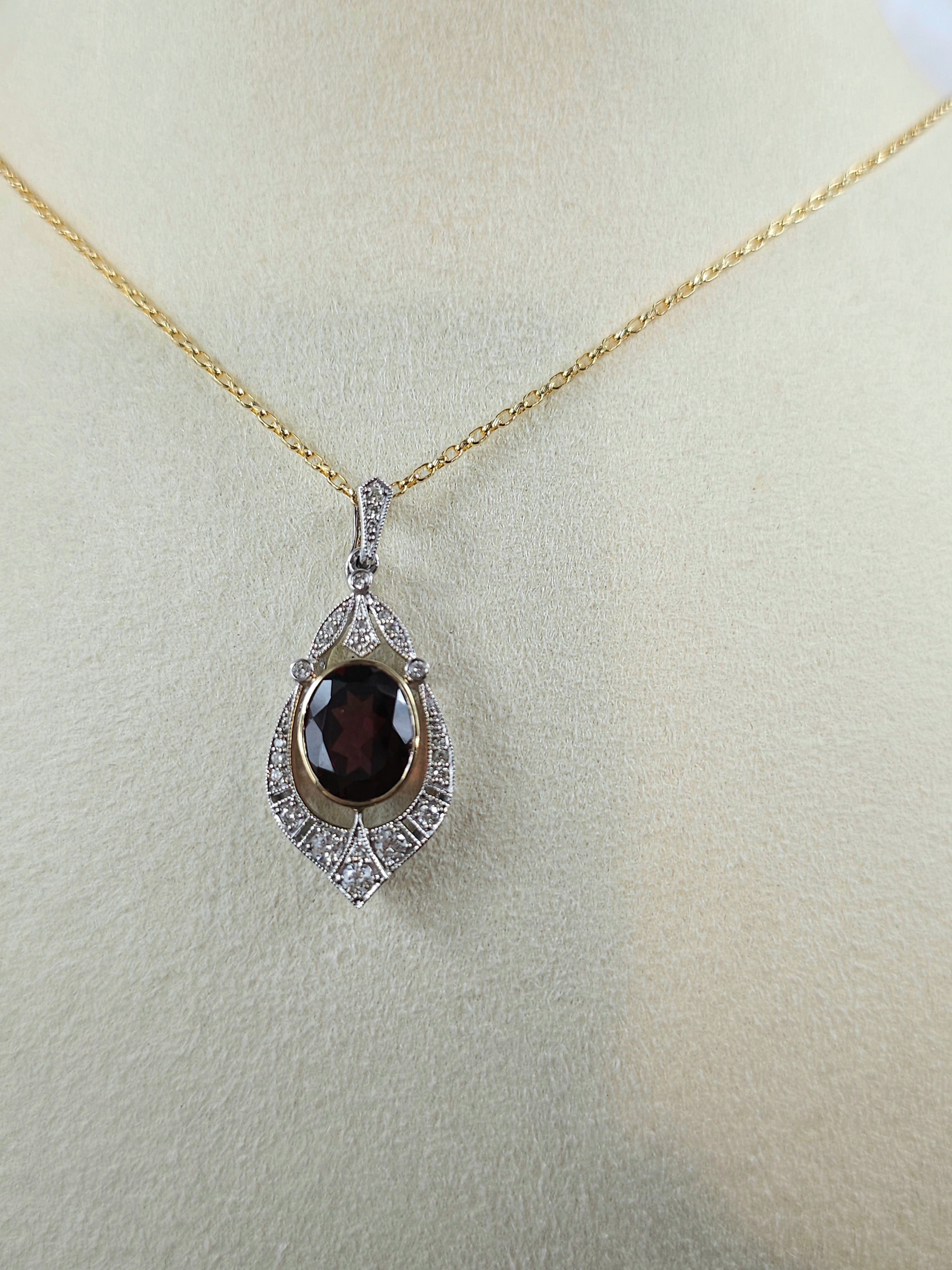 9ct Yellow and White Gold Garnet and Diamond pendant