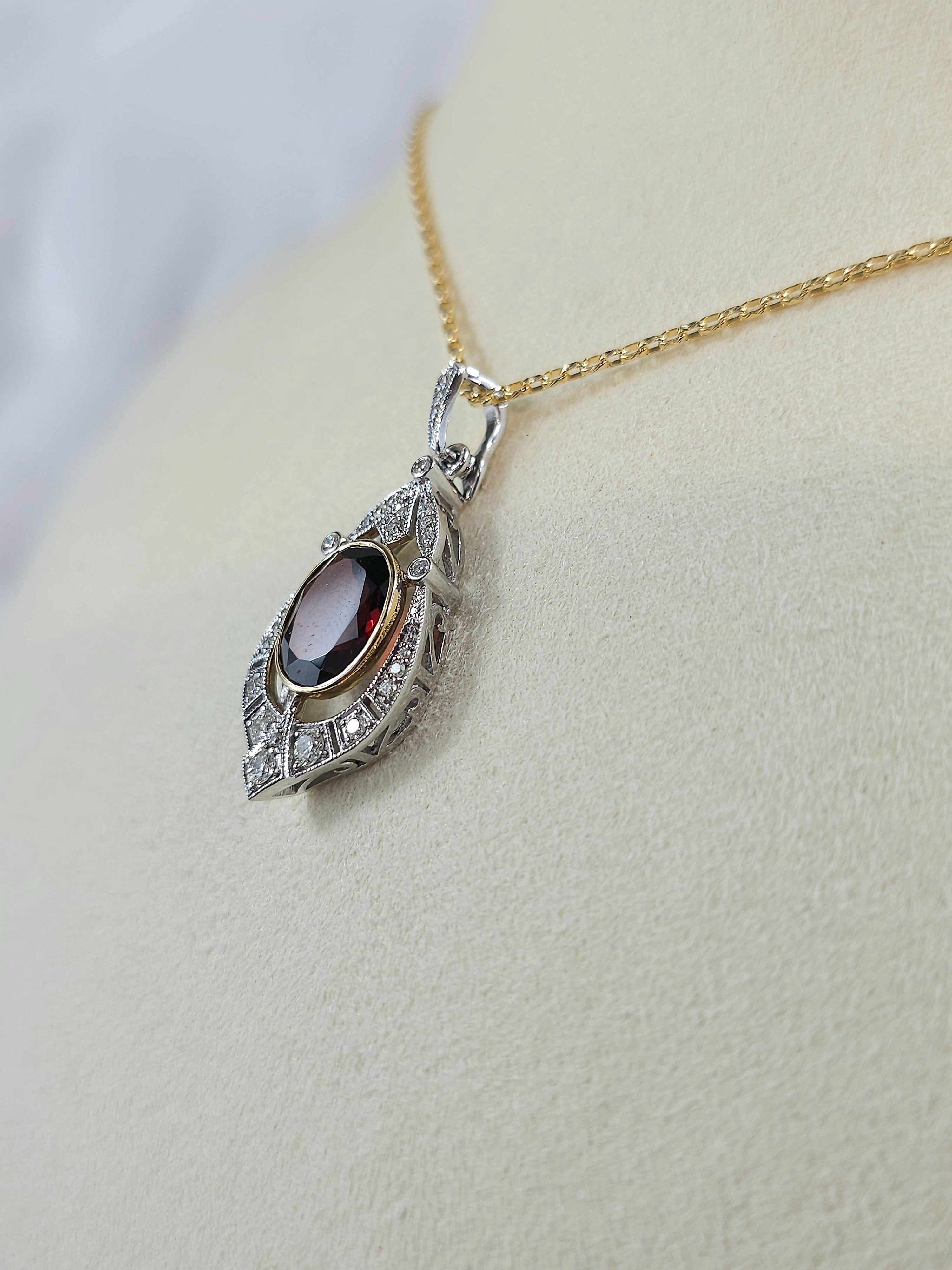 9ct Yellow and White Gold Garnet and Diamond pendant