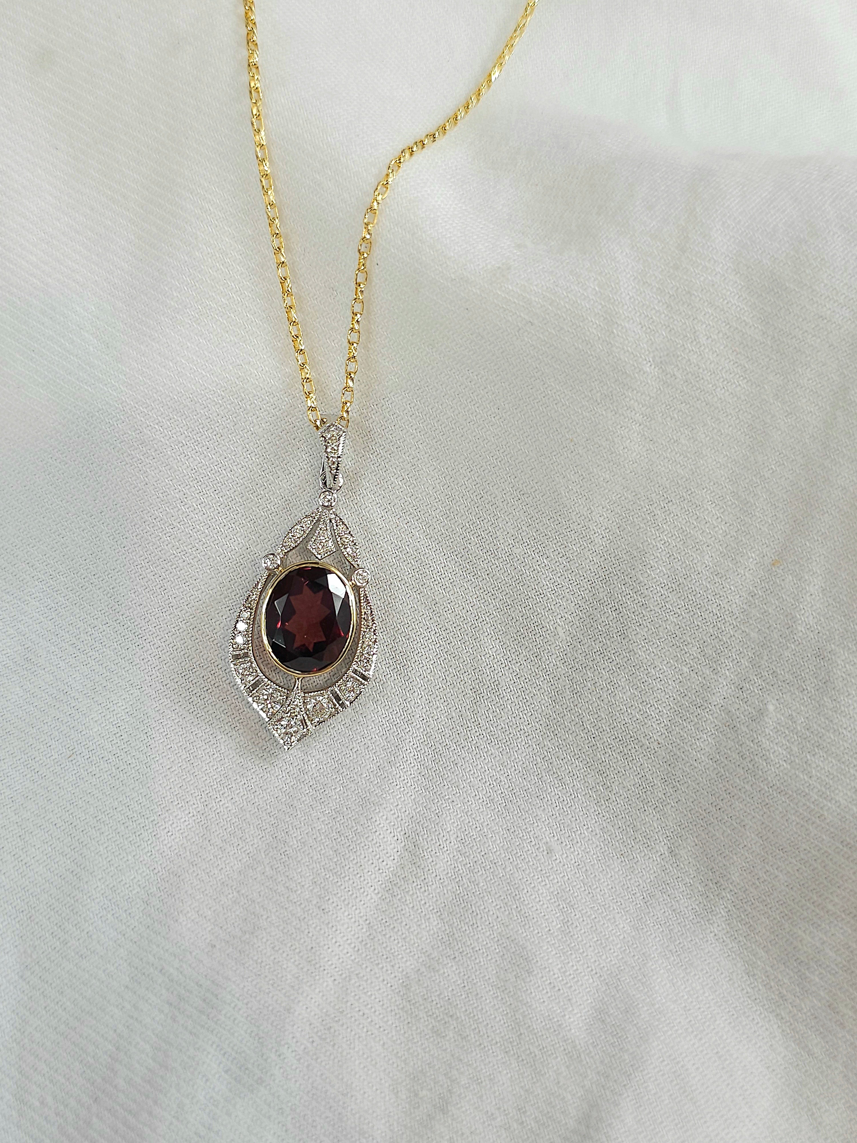 9ct Yellow and White Gold Garnet and Diamond pendant