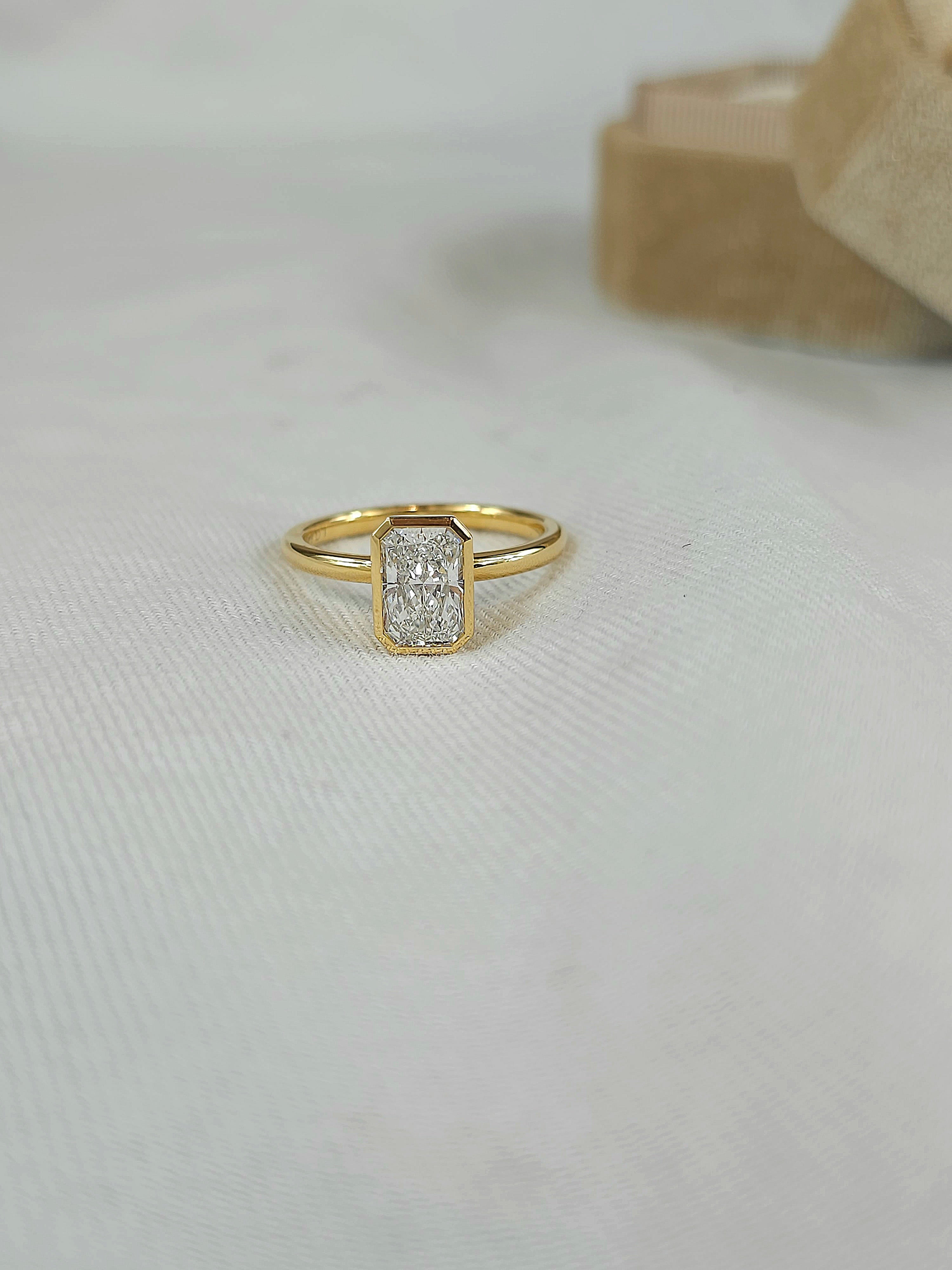 18ct Yellow Gold Lab-Grown Radiant Bezel set engagement ring, 1.50ct