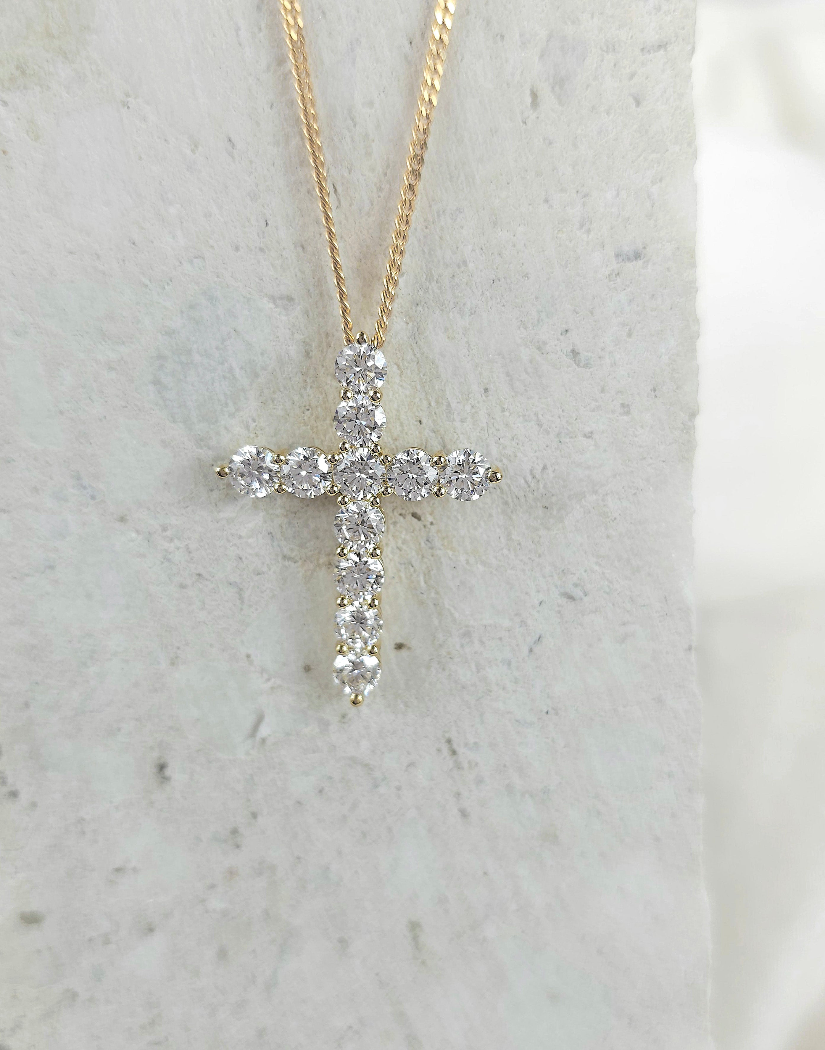 9ct Yellow and White Gold Diamond cross, 2.50 carats total.