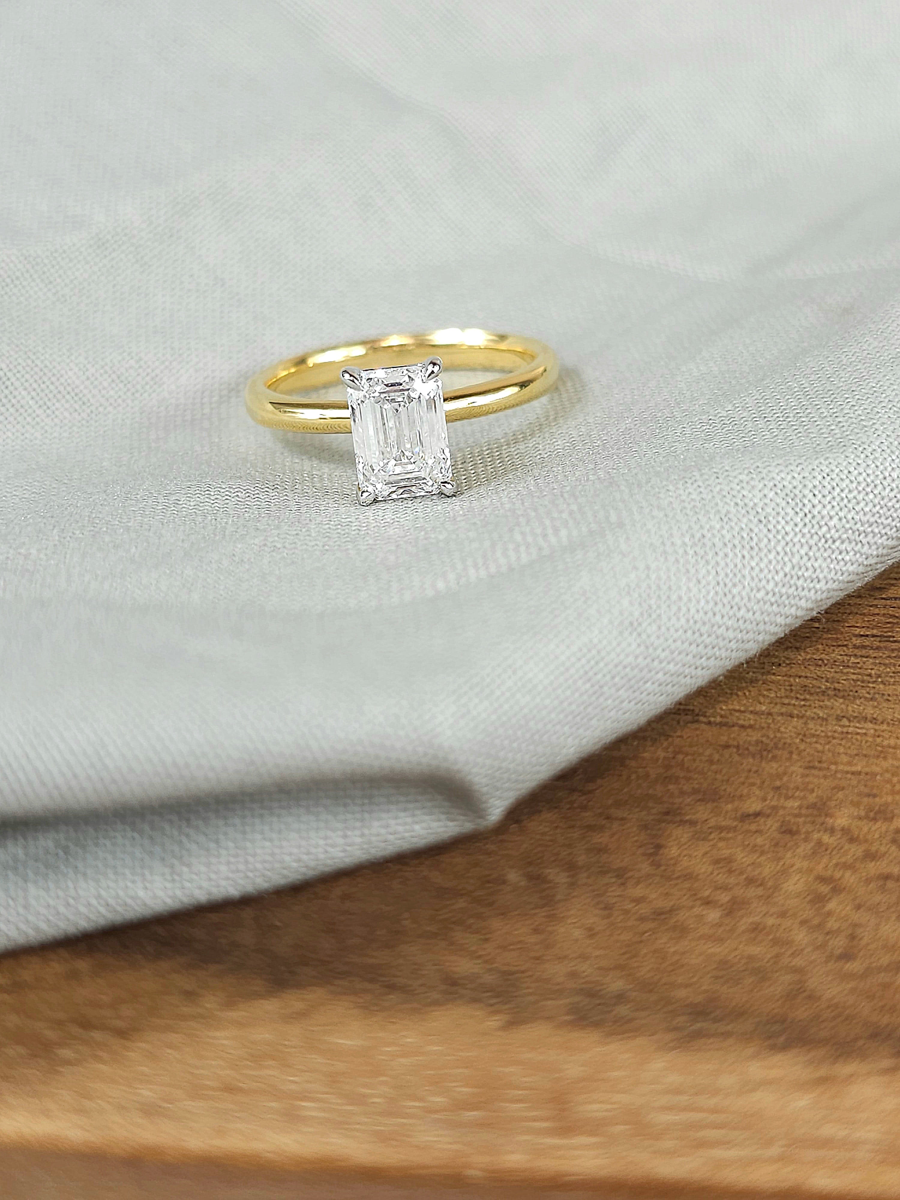 18ct Yellow and White Gold Lab-Grown Emerald cut Diamond engagement ring, 1.52ct centre