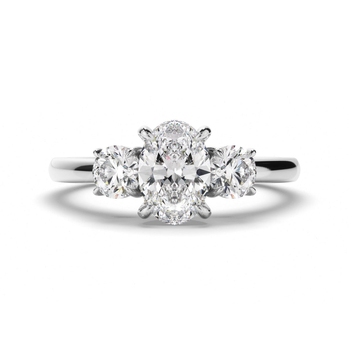 Oval Cut Diamond Trilogy Engagement Ring with Round Brilliant Sides