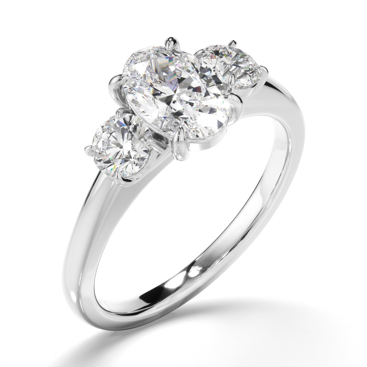 Oval Cut Diamond Trilogy Engagement Ring with Round Brilliant Sides