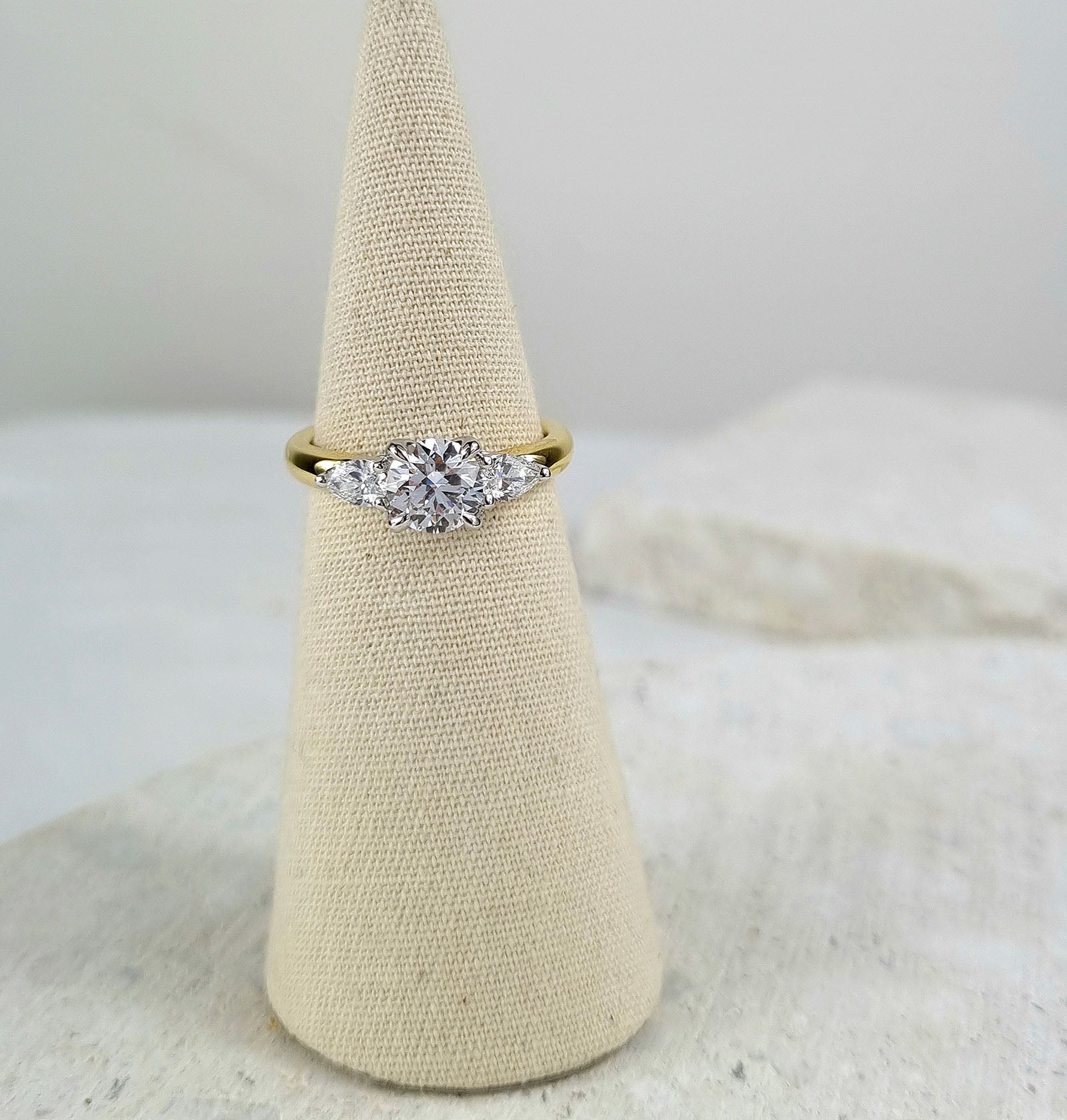 18ct Yellow and White Gold Lab-Grown Round and Pear Trilogy Diamond Engagement ring, 1.03ct centre