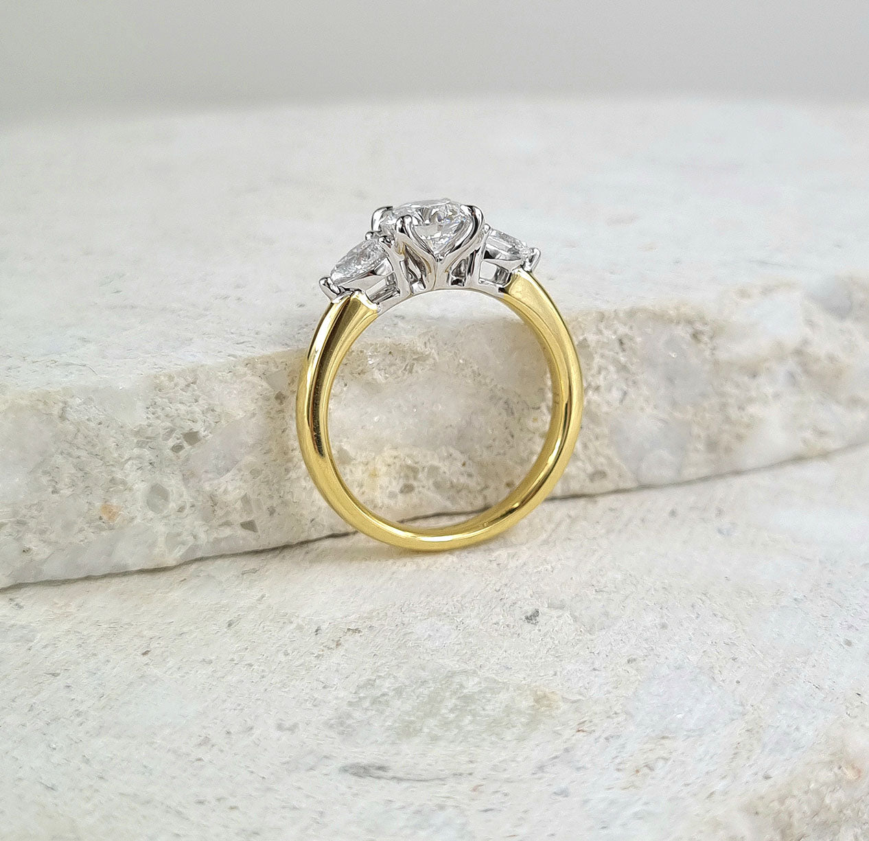 18ct Yellow and White Gold Lab-Grown Round and Pear Trilogy Diamond Engagement ring, 1.03ct centre